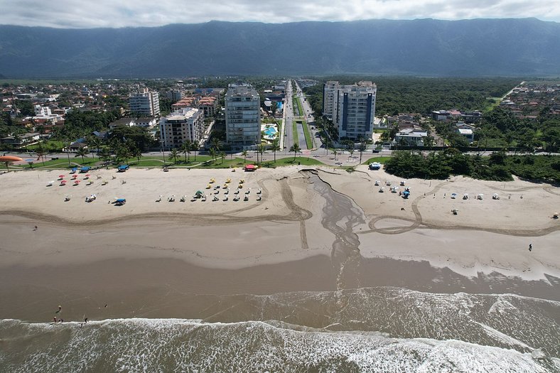 Home 49 I Apto pé na areia e piscina aquecida em Bertioga