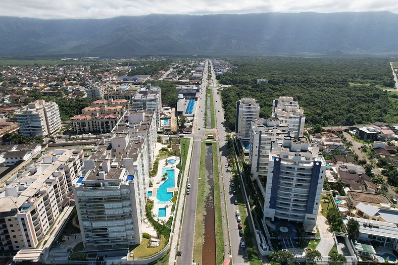 Home 49 I Apto pé na areia e piscina aquecida em Bertioga