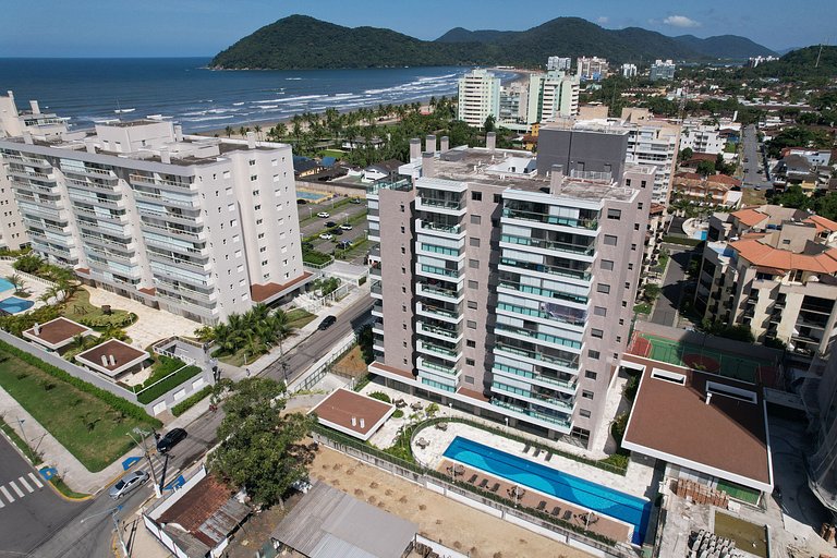 Home 49 I Apto pé na areia e piscina aquecida em Bertioga